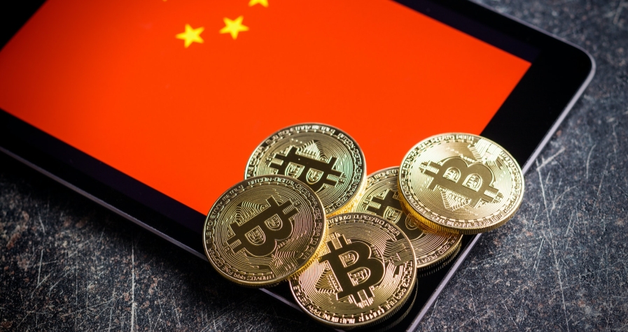 Golden bitcoins and chinese flag.